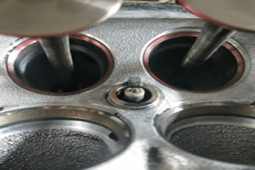 What are the causes of valve seat looseness